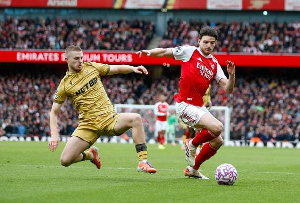Declan Rice of Arsenal is tackled by Adam Wharton of Crystal Palace Arsenal v Crystal Palace, Football, Premier League, Emirates Stadium, Islington, London, UK - 26 10 2025 EDITORIAL USE ONLY No use with unauthorised audio, video, data, fixture lists (outside the EU), club league logos or live services. Online in-match use limited to 45 images (+15 in extra time). No use to emulate moving images. No use in betting, games or Copyright: xMattxImpey Shutterstockx 15615303y
