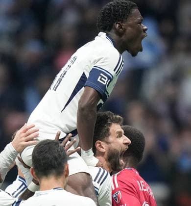 October 26, 2025, Vancouver, Bc, CANADA: Vancouver Whitecaps Thomas Muller, back right, and Emmanuel Sabbi, top, celebrate Muller s penalty kick goal against FC Dallas during the second half in Game 1 of a first round MLS, Fussball Herren, USA Cup playoff soccer match, in Vancouver, B.C., Sunday, Oct. 26, 2025. Canada News - October 26, 2025 - ZUMAc35_ 20251026_zaf_c35_074 Copyright: xDarrylxDyckx