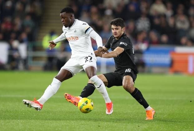 Zeidane Inoussa of Swansea City and Abdukodir Khusanov of Manchester City in action Swansea City v Manchester City, EFL Carabao Cup, Fourth Round, Football, Swansea.com Stadium, Swansea, UK - 29 Oct 2025Swansea Swansea.com Stadium United Kingdom EDITORIAL USE ONLY No use with unauthorised audio, video, data, fixture lists, club league logos or live services. Online in-match use limited to 120 images, no video emulation. No use in betting, games or single club league player publications. Copyright: xKieranxMcManus Shutterstockx 15627840t