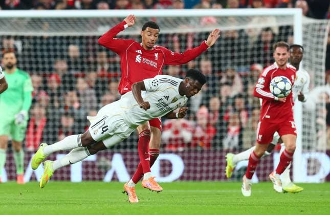 Hugo Ekitike of Liverpool and Aurà lien Tchouamà ni of Real Madrid Liverpool v Real Madrid, UEFA Champions League, Group Stage, Football, Anfield, Liverpool, UK - 04 Nov 2025Liverpool Anfield United Kingdom EDITORIAL USE ONLY No use with unauthorised audio, video, data, fixture lists, club league logos or live services. Online in-match use limited to 120 images, no video emulation. No use in betting, games or single club league player publications. Copyright: xPaulxCurrie Shutterstockx 15642053az