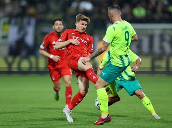 Stuart Armstrong of Aberdeen in action against Dorde Ivanovic of AEK Larnaca AEK Larnaca v Aberdeen, UEFA Conference League, Group Stage, Football, AEK Arena, Larnaca, Cyprus - 06 Nov 2025Larnaca AEK Arena Cyprus EDITORIAL USE ONLY No use with unauthorised audio, video, data, fixture lists, club league logos or live services. Online in-match use limited to 120 images, no video emulation. No use in betting, games or single club league player publications. Copyright: xCharaxSavvides Shutterstockx 15642241bb