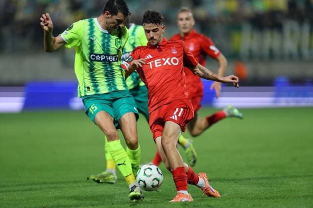 Hrvoje Milicevic of AEK Larnaca in action against Nicolas Milanovic of Aberdeen AEK Larnaca v Aberdeen, UEFA Conference League, Group Stage, Football, AEK Arena, Larnaca, Cyprus - 06 Nov 2025Larnaca AEK Arena Cyprus EDITORIAL USE ONLY No use with unauthorised audio, video, data, fixture lists, club league logos or live services. Online in-match use limited to 120 images, no video emulation. No use in betting, games or single club league player publications. Copyright: xCharaxSavvides Shutterstockx 15642241db