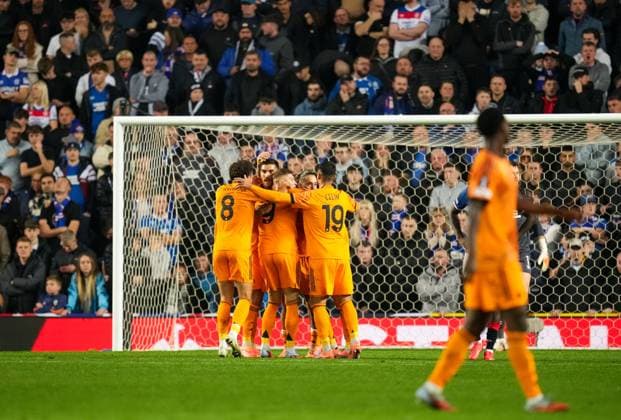 Roma players celebrate after Lorenzo Pellegrini scored to give Roma a 0-2 lead. Rangers v Roma, UEFA Europa League, Group Stage, Football, Ibrox Stadium, Glasgow, Scotland, UK - 06 Nov 2025Glasgow Ibrox Scotland United Kingdom EDITORIAL USE ONLY No use with unauthorised audio, video, data, fixture lists, club league logos or live services. Online in-match use limited to 120 images, no video emulation. No use in betting, games or single club league player publications. Copyright: xStuartxWallace Shutterstockx 15642261ag