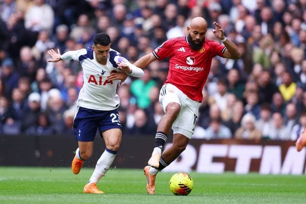London, England, 8th November 2025. Pedro Porro of Tottenham Hotspur and Bryan Mbeumo of Manchester United, ManU challenge for the ball during the Tottenham Hotspur vs Manchester United Premier League match at the Tottenham Hotspur Stadium, London. Picture credit should read: Paul Terry Sportimage EDITORIAL USE ONLY. No use with unauthorised audio, video, data, fixture lists, club league logos or live services. Online in-match use limited to 120 images, no video emulation. No use in betting, games or single club league player publications. SPI_014_PT_Tottenaham_Man_Utd SPI-4271-0014