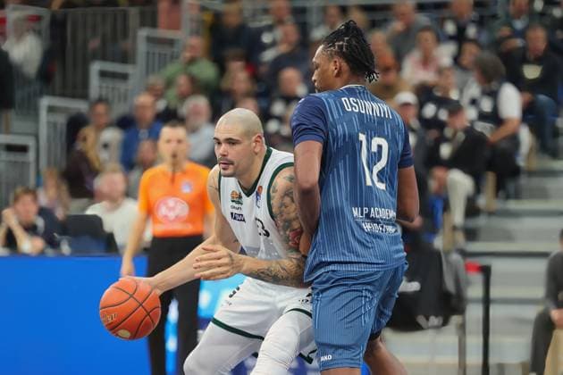 v.li. Maik Zirbes (Vet-Concept Gladiators Trier, 33), Osun Osunniyi (MLP Academics Heidelberg, 12) GER, MLP Academics Heidelberg vs. Vet-Concept Gladiators Trier, Basketball, easycredit Basketball Bundesliga, 7.Spieltag, Saison, 2025 2026, 09.11.2025 GER, MLP Academics Heidelberg vs. Vet-Concept Gladiators Trier, Basketball, easycredit Basketball Bundesliga, 7.Spieltag, Saison, 2025 2026, 09.11.2025 Heidelberg Copyright: xEibner-Pressefoto JoergxHirschx EP_JHH