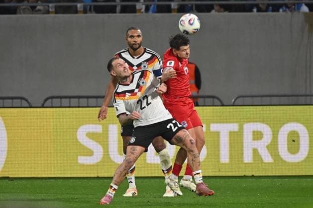 14.11.2025, xjrdrx, Fussball, WM-Qualifikation 2026 Luxemburg - Deutschland emspor, v.l. David Raum (Deutschland), Jonathan Tah (Deutschland), Olivier Thill (Luxemburg, 15) Zweikampf, Duell, Kampf, tackle (DFL DFB REGULATIONS PROHIBIT ANY USE OF PHOTOGRAPHS as IMAGE SEQUENCES and or QUASI-VIDEO) Luxemburg