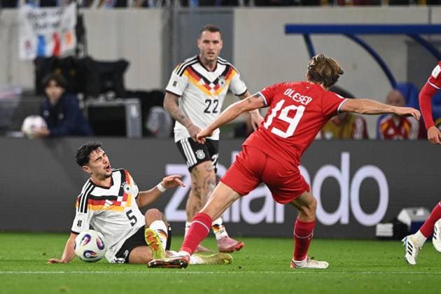 v.l. Alexandar PAVLOVIC (GER) , David RAUM (GER) und Mathias OLESEN (LUX) Aktion, Zweikampf, Luxemburg (LUX - Deutschland (GER) 0-2 Fussball Laenderspiel, WM Qualifikation Europa Gruppe A, Spieltag 9, matchday9, am 14.1.2025, Stade de Luxembourg, Luxemburg, Â