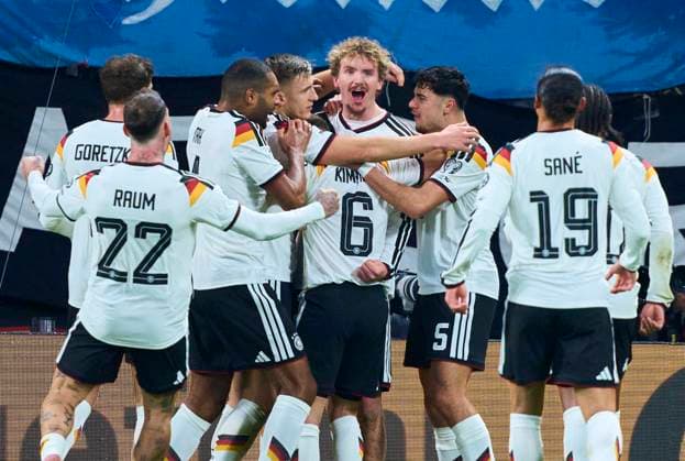 Nick Woltemade of Germany scores, shoots goal , Tor, Treffer, Torschuss, 1-0 celebrates his her goal, happy, laugh, celebration, in the FIFA World Cup, WM, Weltmeisterschaft, Fussball 2026 qualifier match GERMANY - SLOVAKIA in Season 2025 2026 at November 17, 2025 in Leipzig, Germany.