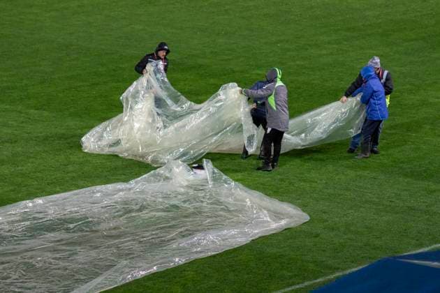 November 18, 2025, FIFA World Cup, WM, Weltmeisterschaft, Fussball Qualifier, Qualifying round, Matchday 10, Group H, Romania vs San Marino,Stadionul Ilie Oana, Ploiesti, Romania Workers protect the pich with plastic sheet befor the start of the game.