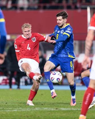SOCCER - FIFA WC quali, AUT vs BIH VIENNA,AUSTRIA,18.NOV.25 - FIFA World Cup, WM, Weltmeisterschaft, Fussball 2026, European Qualifiers, group stage, OEFB international match, Länderspiel, Nationalmannschaft Austria vs Bosnia and Herzegovina. Image shows Xaver Schlager (AUT) and Armin Gigovic (BIH). GEPAxpictures xArminxRauthner