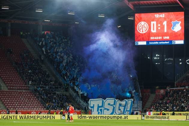 Fanblock Hoffenheim mit Bengalos FSV Mainz 05 vs TSG Hoffenheim, Fussball, 1. Bundesliga, 11. Spieltag, Saison 2025 2026, 21.11.2025 DFB regulations prohibit any use of photographs as image sequences and or quasi-video. FSV Mainz 05 vs TSG Hoffenheim, Fussball, 1. Bundesliga, 11. Spieltag, Saison 2025 2026, 21.11.2025 Copyright: xEibner-Pressefoto AlexanderxNeisx EP_ANS