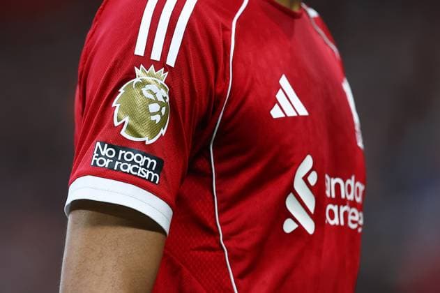 The gold Premier League champions arm patch on the sleeve of the Liverpool home shirt Liverpool v Nottingham Forest, Premier League, Football, Anfield, Liverpool, UK - 22 Nov 2025Liverpool Anfield United Kingdom EDITORIAL USE ONLY No use with unauthorised audio, video, data, fixture lists, club league logos or live services. Online in-match use limited to 120 images, no video emulation. No use in betting, games or single club league player publications. Copyright: xMattxWest Shutterstockx 15860648ad