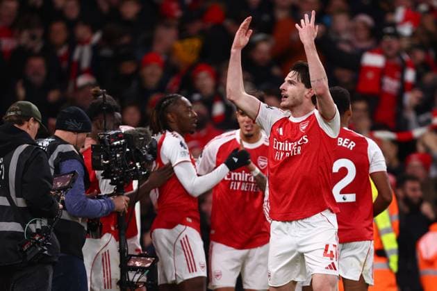 Declan Rice of Arsenal celebrates his sides second goal scorer by Eberechi Eze of Arsenal - Arsenal v Tottenham Hotspur, Premier League, Emirates Stadium, London, UK - 23rd November 2025 Editorial Use Only - DataCo restrictions apply Arsenal v Tottenham Hotspur, Premier League, Football, Emirates Stadium, London, UK - 23 Nov 2025London Emirates Stadium United Kingdom EDITORIAL USE ONLY No use with unauthorised audio, video, data, fixture lists, club league logos or live services. Online in-match use limited to 120 images, no video emulation. No use in betting, games or single club league player publications. Copyright: xMDI Shutterstockx 15874294w