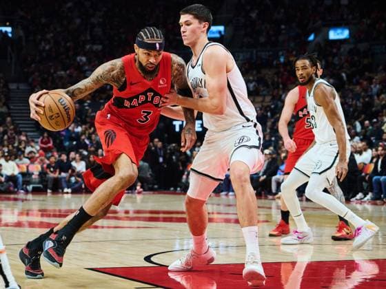 November 23, 2025, Toronto, On, Canada: Toronto Raptors Brandon Ingram (3) drives through Brooklyn Nets Egor Do«min (8) during first half NBA, Basketball Herren, USA basketball action in Toronto, on Sunday, Nov. 23, 2025. Canada News - November 23, 2025 - ZUMAc35_ 20251123_zaf_c35_109 Copyright: xSammyxKoganx