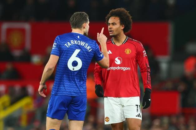 Joshua Zirkzee of Manchester United, ManU and James Tarkowski of Everton clash during the game Manchester United v Everton, Premier League, Football, Old Trafford, Manchester, UK - 24 Nov 2025Manchester Old Trafford United Kingdom EDITORIAL USE ONLY No use with unauthorised audio, video, data, fixture lists, club league logos or live services. Online in-match use limited to 120 images, no video emulation. No use in betting, games or single club league player publications. Copyright: xPaulxCurrie Shutterstockx 15918214ba