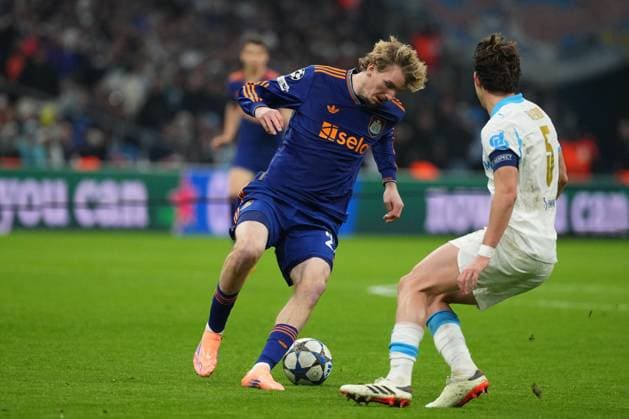 Nick Woltemade of Newcastle takes on Leonardo Balerdi of Marseille Marseille v Newcastle United, UEFA Champions League, Group Stage, Football, Orange Velodrome, Marseille, France- 25 Nov 2025Marseille Orange Vélodrome France EDITORIAL USE ONLY No use with unauthorised audio, video, data, fixture lists, club league logos or live services. Online in-match use limited to 120 images, no video emulation. No use in betting, games or single club league player publications. Copyright: xDavexWinter Shutterstockx 15918266db