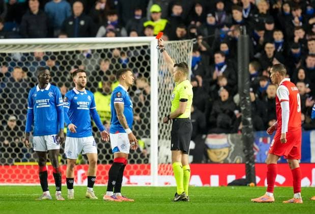 Referee Allard Lindhout shows a red card to Mohamed Diomande of Rangers, far left, sending him off for a second yellow card offence. Rangers v Braga, UEFA Europa League, Group Stage, Football, Ibrox Stadium, Glasgow, Scotland, UK - 27 Nov 2025Glasgow Ibrox Scotland United Kingdom EDITORIAL USE ONLY No use with unauthorised audio, video, data, fixture lists, club league logos or live services. Online in-match use limited to 120 images, no video emulation. No use in betting, games or single club league player publications. Copyright: xStuartxWallace Shutterstockx 15928082bv