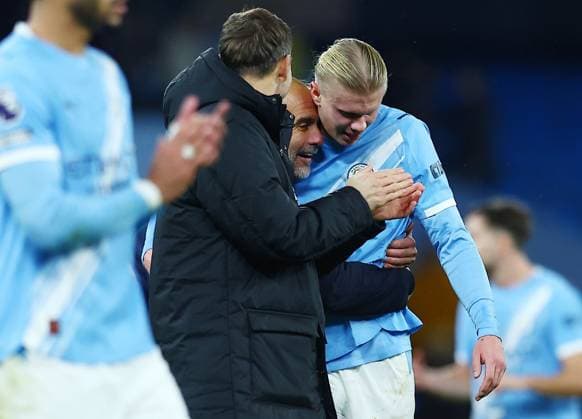 Manchester City manager Pep Guardiola and Erling Haaland have a long conversation at the end of the match Manchester City v Leeds United, Premier League, Football, Etihad Stadium, Manchester, UK - 29 Nov 2025Manchester Etihad Stadium United Kingdom EDITORIAL USE ONLY No use with unauthorised audio, video, data, fixture lists, club league logos or live services. Online in-match use limited to 120 images, no video emulation. No use in betting, games or single club league player publications. Copyright: xMattxWest Shutterstockx 15941574ab