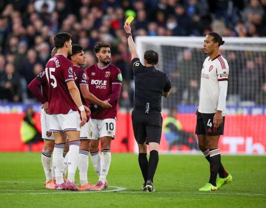 Lucas Paqueta of West Ham United is shown a yellow card and then a Red and is sent off for talking back to referee Darren England West Ham v Liverpool, Football, Premier League, London Stadium, London, UK, 30 11 25 EDITORIAL USE ONLY No use with unauthorised audio, video, data, fixture lists (outside the EU), club league logos or live services. Online in-match use limited to 45 images (+15 in extra time). No use to emulate moving images. No use in betting, games or Copyright: xAnthonyxHanc Shutterstockx 15992998ax