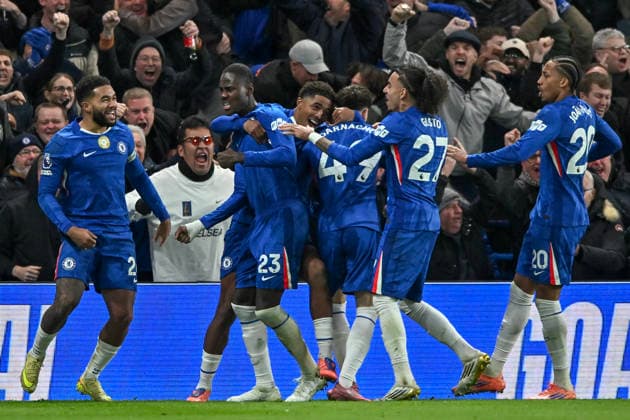 (251201) -- LONDON, Dec. 1, 2025 -- Trevoh Chalobah of Chelsea celebrates scoring with teammates during the English Premier League match between Arsenal FC and Chelsea FC in London, Britain, on Nov. 30, 2025. FOR EDITORIAL USE ONLY. NOT FOR SALE FOR MARKETING OR ADVERTISING CAMPAIGNS. NO USE WITH UNAUTHORIZED AUDIO, VIDEO, DATA, FIXTURE LISTS, CLUB LEAGUE LOGOS OR LIVE SERVICES. ONLINE IN-MATCH USE LIMITED TO 45 IMAGES, NO VIDEO EMULATION. NO USE IN BETTING, GAMES OR SINGLE CLUB LEAGUE PLAYER PUBLICATIONS. (SP)BRITAIN-LONDON-FOOTBALL-PREMIER LEAGUE-ARSENAL VS CHELSEA LixYing