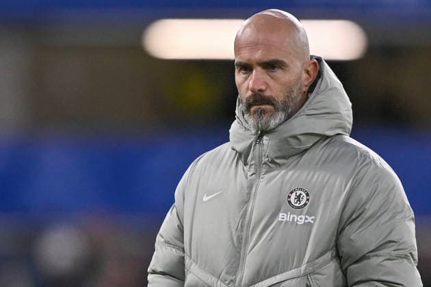 (251201) -- LONDON, Dec. 1, 2025 -- Chelseal s head coach Enzo Maresca reacts before the English Premier League match between Arsenal FC and Chelsea FC in London, Britain, on Nov. 30, 2025. FOR EDITORIAL USE ONLY. NOT FOR SALE FOR MARKETING OR ADVERTISING CAMPAIGNS. NO USE WITH UNAUTHORIZED AUDIO, VIDEO, DATA, FIXTURE LISTS, CLUB LEAGUE LOGOS OR LIVE SERVICES. ONLINE IN-MATCH USE LIMITED TO 45 IMAGES, NO VIDEO EMULATION. NO USE IN BETTING, GAMES OR SINGLE CLUB LEAGUE PLAYER PUBLICATIONS. (SP)BRITAIN-LONDON-FOOTBALL-PREMIER LEAGUE-ARSENAL VS CHELSEA LixYing