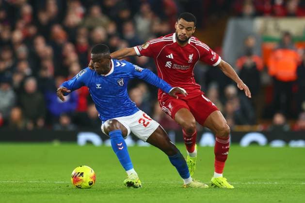 Nordi Mukiele of Sunderland and Cody Gakpo of Liverpool Liverpool v Sunderland, Premier League, Football, Anfield, Liverpool, UK - 03 Dec 2025Liverpool Anfield United Kingdom EDITORIAL USE ONLY No use with unauthorised audio, video, data, fixture lists, club league logos or live services. Online in-match use limited to 120 images, no video emulation. No use in betting, games or single club league player publications. Copyright: xPaulxCurrie Shutterstockx 16006099bz