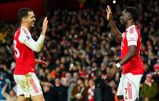 Bukayo Saka of Arsenal celebrates scoring a goal after making it 2-0 with fellow scorer Mikel Merino Arsenal v Brentford, Premier League, Football, Emirates Stadium, London, UK - 03 Dec 2025London Emirates Stadium United Kingdom EDITORIAL USE ONLY No use with unauthorised audio, video, data, fixture lists, club league logos or live services. Online in-match use limited to 120 images, no video emulation. No use in betting, games or single club league player publications. Copyright: xJavierxGarcia Shutterstockx 16006081ag