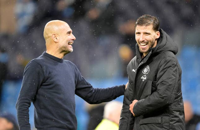 Manager Pep Guardiola of Manchester City celebrates with Ruben Dias at the end of the game Manchester City v Sunderland, Premier League, Football, Etihad Stadium, Manchester, UK - 06 Dec 2025Manchester Etihad Stadium United Kingdom EDITORIAL USE ONLY No use with unauthorised audio, video, data, fixture lists, club league logos or live services. Online in-match use limited to 120 images, no video emulation. No use in betting, games or single club league player publications. Copyright: xGreigxCowie Shutterstockx 16009223ak
