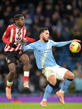 Noah Sadiki of Sunderland and Rayan Cherki of Manchester City Manchester City v Sunderland, Premier League, Football, Etihad Stadium, Manchester, UK - 06 Dec 2025Manchester Etihad Stadium United Kingdom EDITORIAL USE ONLY No use with unauthorised audio, video, data, fixture lists, club league logos or live services. Online in-match use limited to 120 images, no video emulation. No use in betting, games or single club league player publications. Copyright: xGreigxCowie Shutterstockx 16009223ar