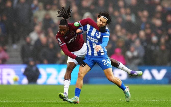 Aaron Wan-Bissaka of West Ham United is fouled by Ferdi Kadioglu of Brighton and Hove Albion. Brighton and Hove Albion v West Ham United, Premier League, Football, American Express Community Stadium, Brighton, UK - 07 Dec 2025Brighton American Express Community Stadi United Kingdom EDITORIAL USE ONLY No use with unauthorised audio, video, data, fixture lists, club league logos or live services. Online in-match use limited to 120 images, no video emulation. No use in betting, games or single club league player publications. Copyright: xJamesxMarsh Shutterstockx 16009415s