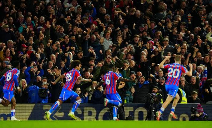 Fans celebrate the winning goal scored by Marc Guehi of Crystal Palace Fulham v Crystal Palace, Premier League, Football, Craven Cottage, London, UK - 07 Dec 2025London Craven Cottage United Kingdom EDITORIAL USE ONLY No use with unauthorised audio, video, data, fixture lists, club league logos or live services. Online in-match use limited to 120 images, no video emulation. No use in betting, games or single club league player publications. Copyright: xJavierxGarcia Shutterstockx 16009431ff