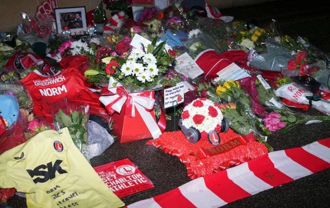 Memorial flowers for Charlton Athletic fan Norman Barker, known as Headphones Norm who died during the home match against Portsmouth causing the match to be abandoned. Charlton Athletic v Middlesbrough, Sky Bet Championship, Football, The Valley, London, UK - 09 Dec 2025London The Valley United Kingdom EDITORIAL USE ONLY No use with unauthorised audio, video, data, fixture lists, club league logos or live services. Online in-match use limited to 120 images, no video emulation. No use in betting, games or single club league player publications. Copyright: xJedxLeicester Shutterstockx 16009821e