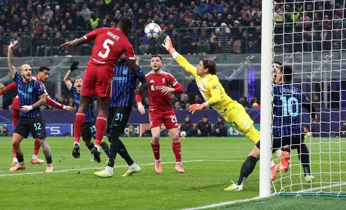 Ibrahima Konatà of Liverpool scores a goal to make the score 0-1 Inter Milan v Liverpool, UEFA Champions League, Group Stage, Football, San Siro Stadium, Milan, Italy- 09 Dec 2025Milan San Siro Italy EDITORIAL USE ONLY No use with unauthorised audio, video, data, fixture lists, club league logos or live services. Online in-match use limited to 120 images, no video emulation. No use in betting, games or single club league player publications. Copyright: xKieranxMcManus Shutterstockx 16009887ae