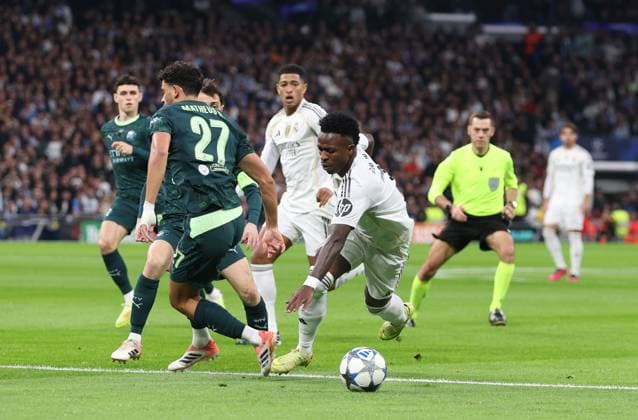 Vinicius Junior of Real Madrid is fouled for a penalty before it is checked by VAR and changed to a free kick Real Madrid v Manchester City, UEFA Champions League, Group Stage, Football, Bernabeu, Madrid, Spain - 10 Dec 2025Madrid Bernabeu Spain EDITORIAL USE ONLY No use with unauthorised audio, video, data, fixture lists, club league logos or live services. Online in-match use limited to 120 images, no video emulation. No use in betting, games or single club league player publications. Copyright: xKieranxMcManus Shutterstockx 16009961l