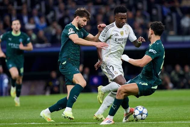 Vinicius Jr of Real Madrid CF and Ruben Dias of Manchester City FC Real Madrid v Manchester City, UEFA Champions League, Football, Estadio Santiago Bernabeu, Madrid, Spain - 10 Dec 2025Madrid Estadio Santiago Bernabu Spain EDITORIAL USE ONLY No use with unauthorised audio, video, data, fixture lists, club league logos or live services. Online in-match use limited to 120 images, no video emulation. No use in betting, games or single club league player publications. Copyright: xRubenxAlbarran Shutterstockx 16073023x