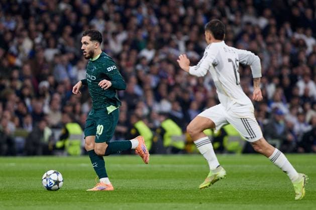 Rayan Cherki of Manchester City FC Real Madrid v Manchester City, UEFA Champions League, Football, Estadio Santiago Bernabeu, Madrid, Spain - 10 Dec 2025Madrid Estadio Santiago Bernabu Spain EDITORIAL USE ONLY No use with unauthorised audio, video, data, fixture lists, club league logos or live services. Online in-match use limited to 120 images, no video emulation. No use in betting, games or single club league player publications. Copyright: xRubenxAlbarran Shutterstockx 16073023bj