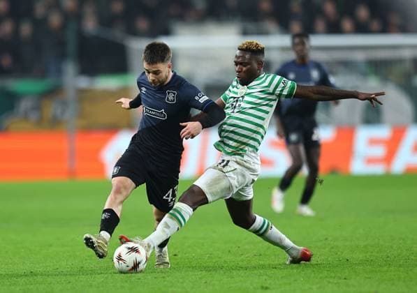 Nicolas Raskin of Rangers and Bamidele Yusuf of Ferencvaros Ferencvaros v Rangers, UEFA Europa League, Group Stage, Football, Groupama Arena, Budapest, Hungary - 11 Dec 2025Budapest Groupama Arena Hungary EDITORIAL USE ONLY No use with unauthorised audio, video, data, fixture lists, club league logos or live services. Online in-match use limited to 120 images, no video emulation. No use in betting, games or single club league player publications. Copyright: xMichaelxZemanek Shutterstockx 16080575ah