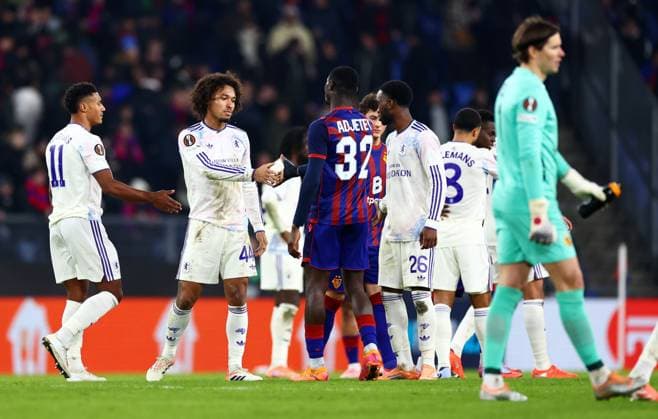 Players shake hands at full time. FC Basel v Aston Villa, UEFA Europa League, Group Stage, Football, St. Jakob-Park, Basel, Switzerland - 11 Dec 2025Basel St. Jakob-Park Switzerland EDITORIAL USE ONLY No use with unauthorised audio, video, data, fixture lists, club league logos or live services. Online in-match use limited to 120 images, no video emulation. No use in betting, games or single club league player publications. Copyright: xJamesxMarsh Shutterstockx 16080606dm