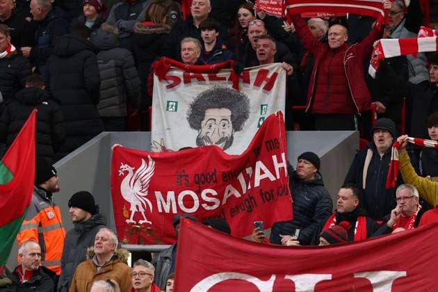A fan holds up a banner of Mohamed Salah of Liverpool Liverpool v Brighton and Hove Albion, Premier League, Football, Anfield, Liverpool, UK - 13 Dec 2025Liverpool Anfield United Kingdom EDITORIAL USE ONLY No use with unauthorised audio, video, data, fixture lists, club league logos or live services. Online in-match use limited to 120 images, no video emulation. No use in betting, games or single club league player publications. Copyright: xRyanxBrowne Shutterstockx 16081506az