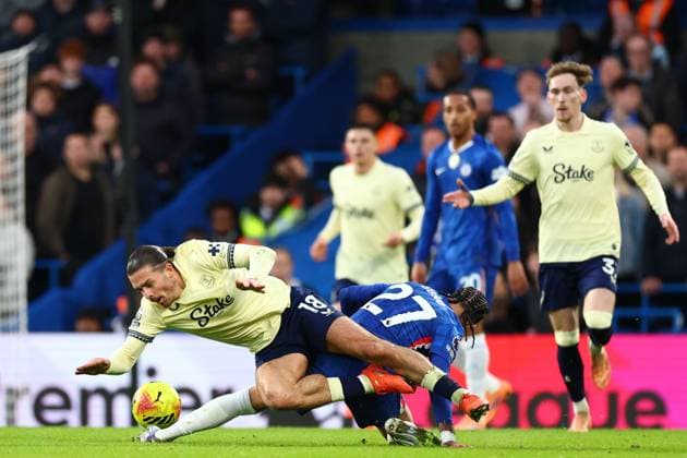 Jack Grealish of Everton tackled by Malo Gusto of Chelsea Chelsea v Everton, Premier League, Football, Stamford Bridge, London, UK - 13 Dec 2025London Stamford Bridge United Kingdom EDITORIAL USE ONLY No use with unauthorised audio, video, data, fixture lists, club league logos or live services. Online in-match use limited to 120 images, no video emulation. No use in betting, games or single club league player publications. Copyright: xSimonxDael Shutterstockx 16081503ay