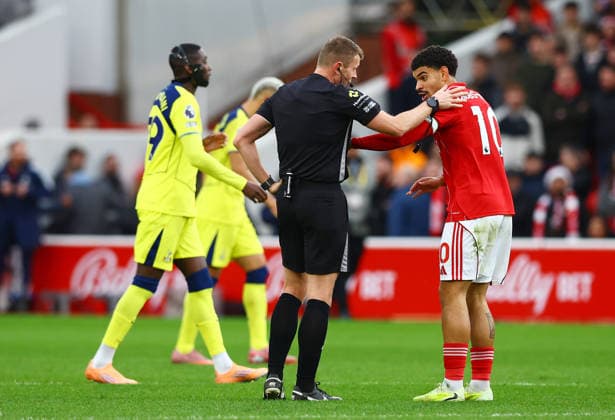 Referee Sam Barrott and Morgan Gibbs-White of Nottingham Forest Nottingham Forest v Tottenham Hotspur, Premier League, Football, City Ground, Nottingham, UK - 14 Dec 2025Nottingham City Ground United Kingdom EDITORIAL USE ONLY No use with unauthorised audio, video, data, fixture lists, club league logos or live services. Online in-match use limited to 120 images, no video emulation. No use in betting, games or single club league player publications. Copyright: xMattxWest Shutterstockx 16081575ap