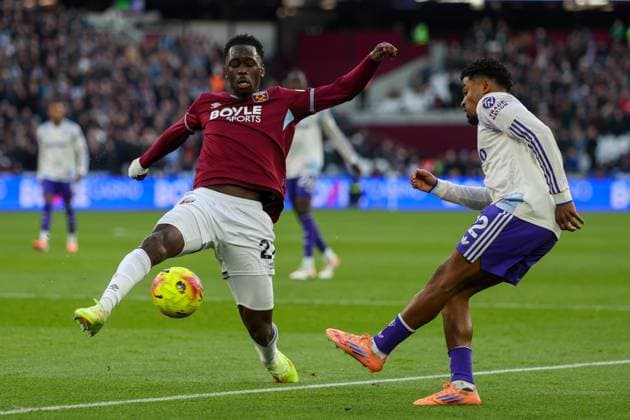 Ian Maatsen of Aston Villa has his shot blocked by Soungoutou Magassa of West Ham West Ham United v Aston Villa, Football, Premier League, London Stadium, London, UK, 14 12 25 EDITORIAL USE ONLY No use with unauthorised audio, video, data, fixture lists (outside the EU), club league logos or live services. Online in-match use limited to 45 images (+15 in extra time). No use to emulate moving images. No use in betting, games or Copyright: xAnthonyxHanc Shutterstockx 16104760am