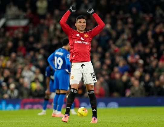 Manchester, England, 15th December 2025. Casemiro of Manchester United, ManU celebrates scoring their second goal during the Manchester United vs AFC Bournemouth Premier League match at Old Trafford, Manchester. Picture credit should read: Andrew Yates Sportimage EDITORIAL USE ONLY. No use with unauthorised audio, video, data, fixture lists, club league logos or live services. Online in-match use limited to 120 images, no video emulation. No use in betting, games or single club league player publications. SPI_052_AY_Man_Utd_Bmouth SPI-4379-0052