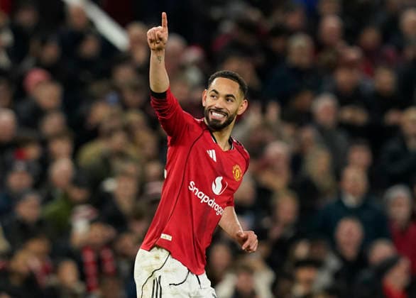 Manchester, England, 15th December 2025. Matheus Cunha of Manchester United, ManU celebrates scoring their fourth goal during the Manchester United vs AFC Bournemouth Premier League match at Old Trafford, Manchester. Picture credit should read: Andrew Yates Sportimage EDITORIAL USE ONLY. No use with unauthorised audio, video, data, fixture lists, club league logos or live services. Online in-match use limited to 120 images, no video emulation. No use in betting, games or single club league player publications. SPI_080_AY_Man_Utd_Bmouth SPI-4379-0080