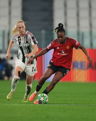 Turin, Italy, 17th December 2025. Melvine Malard of Manchester United, ManU is pursued by Amalie Jorgensen Vangsgaard of Juventus during the Juventus Women vs Manchester United Women UEFA Womens Champions League match at Juventus Stadium, Turin. Picture credit should read: Jonathan Moscrop Sportimage EDITORIAL USE ONLY. No use with unauthorised audio, video, data, fixture lists, club league logos or live services. Online in-match use limited to 120 images, no video emulation. No use in betting, games or single club league player publications. SPI_023_JM_JUVE_MANUTD_UWCL SPI-4364-0023