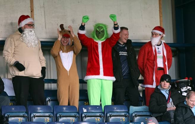 Bolton Wanderers fans in Christmas fancy dress ahead of kick off Wycombe Wanderers v Bolton Wanderers, Sky Bet League One, Football, Adams Park, High Wycombe, UK - 20 Dec 2025High Wycombe Adams Park United Kingdom EDITORIAL USE ONLY No use with unauthorised audio, video, data, fixture lists, club league logos or live services. Online in-match use limited to 120 images, no video emulation. No use in betting, games or single club league player publications. Copyright: xKieranxMcManus Shutterstockx 16148992bb