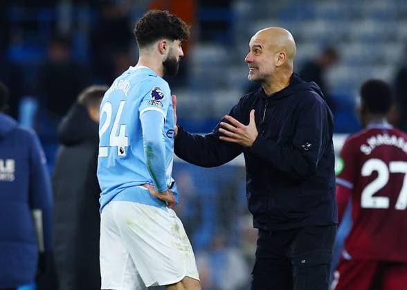 Manchester City manager Pep Guardiola with Josko Gvardiol at the end of the match Manchester City v West Ham United, Premier League, Football, Etihad Stadium, Manchester, UK - 20 Dec 2025Manchester Etihad Stadium United Kingdom EDITORIAL USE ONLY No use with unauthorised audio, video, data, fixture lists, club league logos or live services. Online in-match use limited to 120 images, no video emulation. No use in betting, games or single club league player publications. Copyright: xMattxWest Shutterstockx 16148949aw