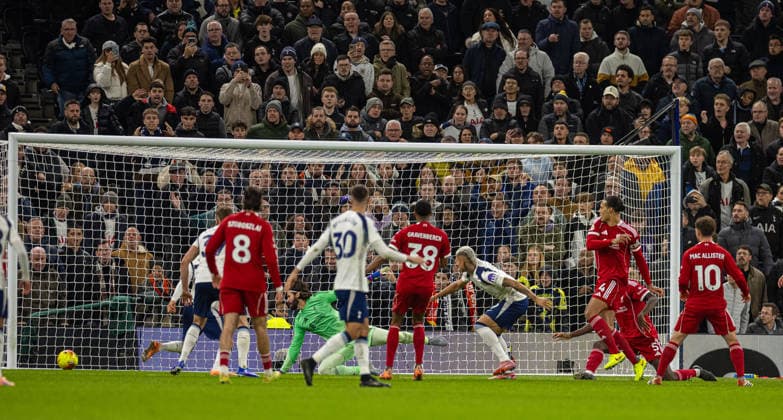 (251221) -- LONDON, Dec. 21, 2025 -- Tottenham Hotspur s Richarlison de Andrade (3rd R) scores during the English Premier League match between Tottenham Hotspur FC and Liverpool FC at the Tottenham Hotspur Stadium in London, Britain, on Dec. 20, 2025. FOR EDITORIAL USE ONLY. NOT FOR SALE FOR MARKETING OR ADVERTISING CAMPAIGNS. NO USE WITH UNAUTHORIZED AUDIO, VIDEO, DATA, FIXTURE LISTS, CLUB LEAGUE LOGOS OR LIVE SERVICES. ONLINE IN-MATCH USE LIMITED TO 45 IMAGES, NO VIDEO EMULATION. NO USE IN BETTING, GAMES OR SINGLE CLUB LEAGUE PLAYER PUBLICATIONS. (SP)BRITAIN-LONDON-FOOTBALL-FA PREMIER LEAGUE-LIVERPOOL FC VS TOTTENHAM HOTSPUR FC LixYing