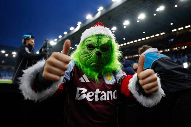 Birmingham, England, 21st December 2025. A young Aston Villa fan dressed as the Christmas Grinch before the Aston Villa vs Manchester United, ManU Premier League match at Villa Park, Birmingham. Picture credit should read: James Baylis Sportimage EDITORIAL USE ONLY. No use with unauthorised audio, video, data, fixture lists, club league logos or live services. Online in-match use limited to 120 images, no video emulation. No use in betting, games or single club league player publications. SPI_001_JB_ASTON_VILLA_MANUTD SPI-4388-0001