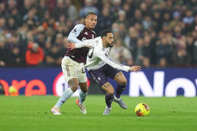 Birmingham, England, 21st December 2025. Matheus Cunha of Manchester United, ManU and Boubacar Kamara of Aston Villa during the Aston Villa vs Manchester United Premier League match at Villa Park, Birmingham. Picture credit should read: James Baylis Sportimage EDITORIAL USE ONLY. No use with unauthorised audio, video, data, fixture lists, club league logos or live services. Online in-match use limited to 120 images, no video emulation. No use in betting, games or single club league player publications. SPI_003_JB_ASTON_VILLA_MANUTD SPI-4388-0003